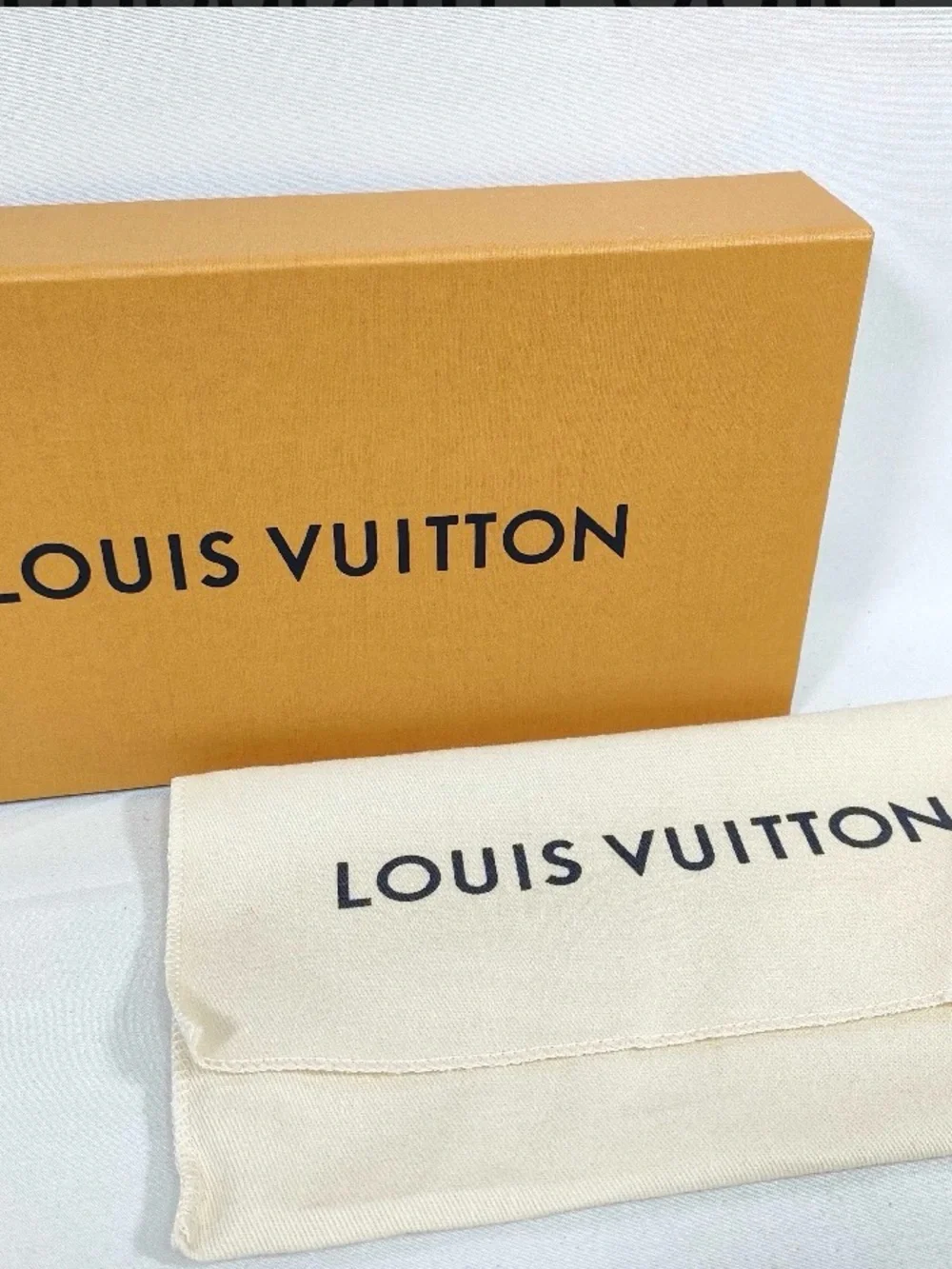 Louis Vuitton Monogram Canvas Zippy Wallet in Brown